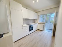 Appartement met 2 kamers, tuin en garage in Strombeek-Bever