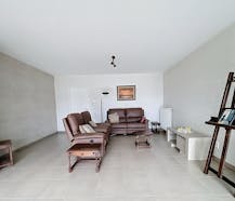 Gelijkvloers appartement met 2 slaapkamers en garagebox!