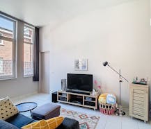Lichtrijk gelijkvloers appartement met 1 slaapkamer!