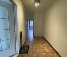 Appartement (1ste verd.) met o.a. 2 slpk, tuin en dubbele staanplaats