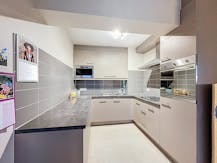 Ruim 2 slaapkamer appartement te Sint-Amands, Heikant 16