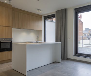 Wonen op twee niveaus in hartje Kortrijk.