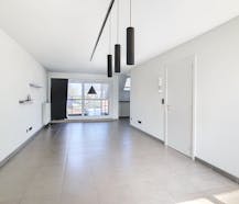 Ruim energiezuinig appartement met garage te Elversele