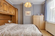 Karaktervol rijhuis met tuin te koop in Mechelen.