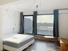 Lichtrijke studio met dubbel terras te huur in Brugge 