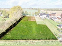 Mooi en zuidgericht stuk bouwgrond (2.461m²) voor open bebouwing