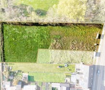 Mooi en zuidgericht stuk bouwgrond (2.461m²) voor open bebouwing