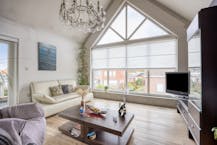 Ruime woning met tuin en handelsruimte of kantoor op glvl