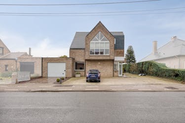 Ruime woning met tuin en handelsruimte of kantoor op glvl