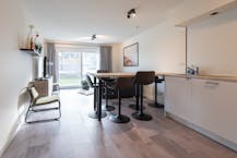 Magnifiek gelijkvloers appartement met zonnig tuintje