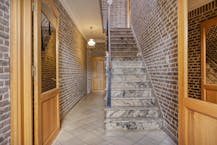 Handelshuis met café en feestzaal + bouwgrond te koop in Tongerlo 