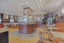 Patrimoniumvennootschap bestaande uit restaurant en 3 appartementen