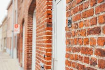 Polyvalent eigendom: woning, winkelruimte én loods te koop in Merkem op 1.885m²