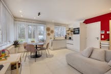 Gelijkvloers appartement met prachtige zuid-tuin en garage