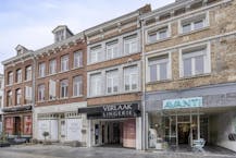 Stijlvolle stadswoning met handelspand te koop in hartje Maaseik