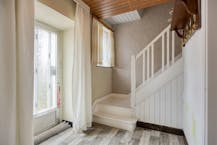 Te renoveren woning met zonnige tuin in Genk