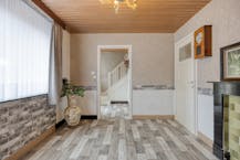 Te renoveren woning met zonnige tuin in Genk