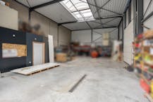 Opslagplaats met buitenruimte op toplocatie in Genk-Noord!