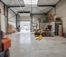 Opslagplaats met buitenruimte op toplocatie in Genk-Noord!