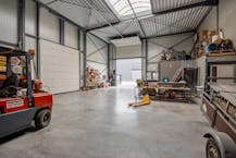 Opslagplaats met buitenruimte op toplocatie in Genk-Noord!