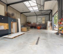 Opslagplaats met buitenruimte op toplocatie in Genk-Noord!