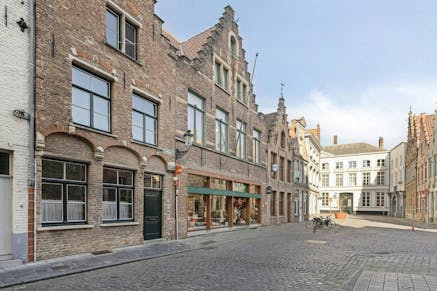 Handelspand met woonst te koop Brugge