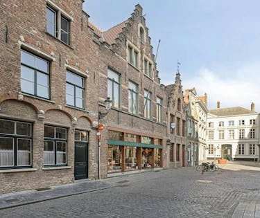 Handelspand met woonst te koop in Brugge