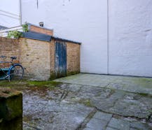 Te renoveren opbrengsteigendom te koop in Brugge centrum