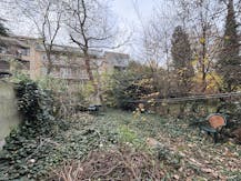 Opbrengsteigendom met 2 appartementen en garage 