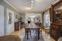 Riante zorgwoning/kangoeroewoning met loods te koop