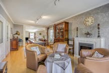 Riante zorgwoning/kangoeroewoning met loods te koop