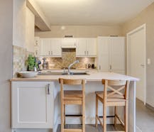 Energiezuinige woning met 3 slaapkamers, garage en tuin.