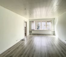 Appartement (1ste verd.) met o.a. 2 slpk, tuin en dubbele staanplaats