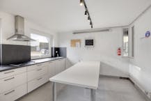 Opbrengsteigendom met 9 studentenkamers en duplex-appartement te Hasselt