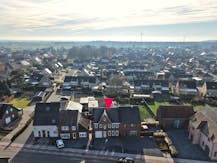 Woning met magazijn en 200 m² polyvalente ruimte in Dilsen